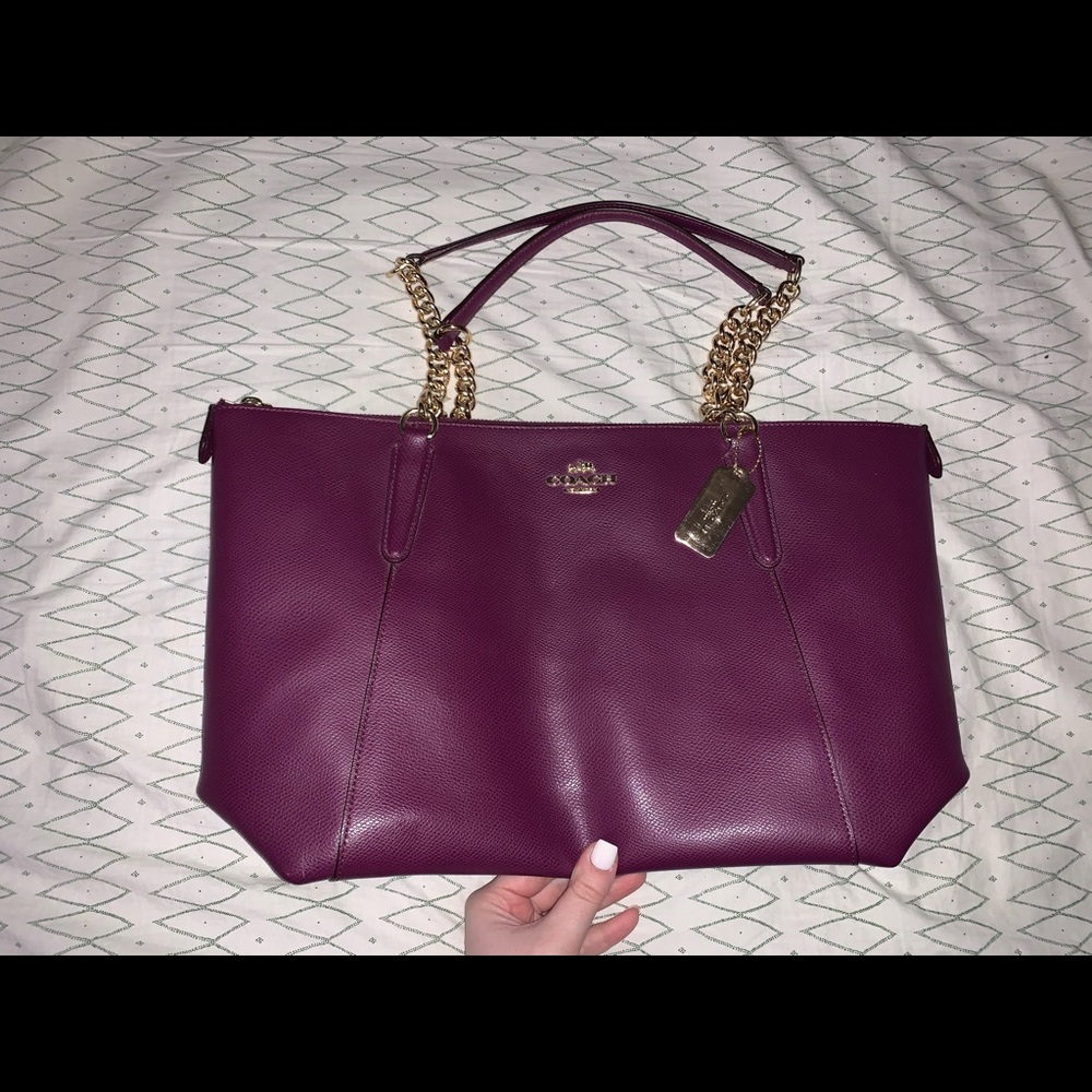 Purple Coach bag with gold chains